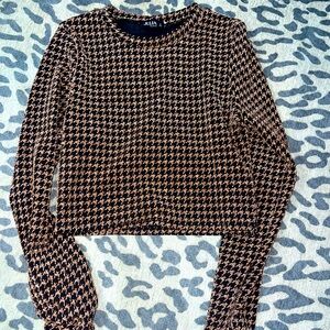 Stretchy top. It’s more of a copper/brown